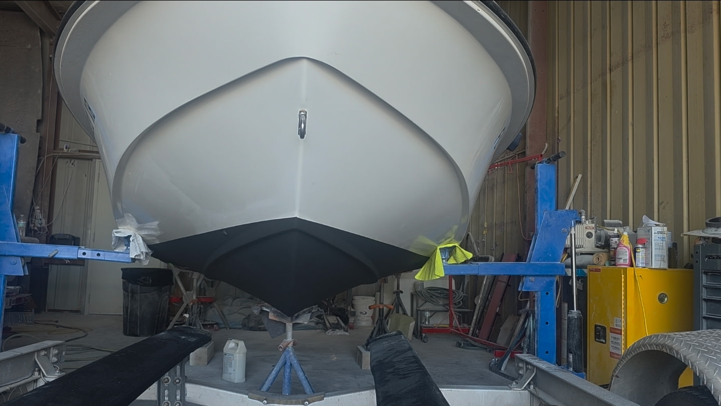 Boat bottom paint application in progress