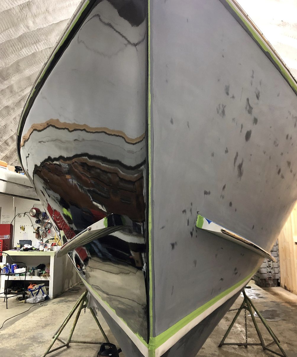 Custom fiberglass fabrication piece being shaped
